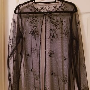 Sheer beatted evening wear